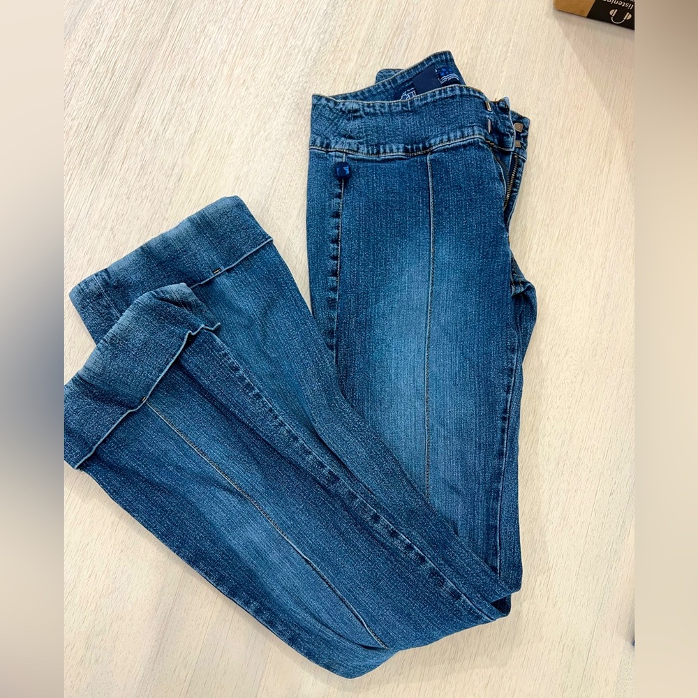 Bellbottom jeans, pre loved , small slit on bottom as seen